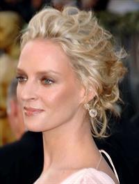 Uma Thurman in a white dress