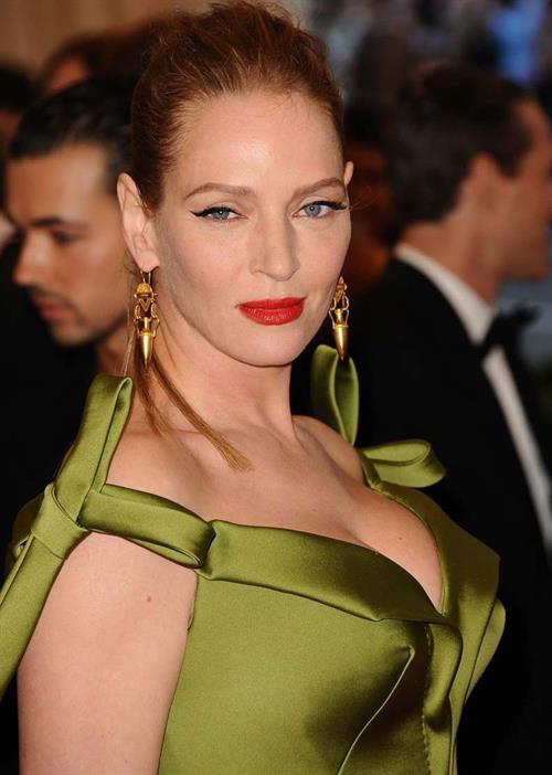 Uma Thurman in a green dress