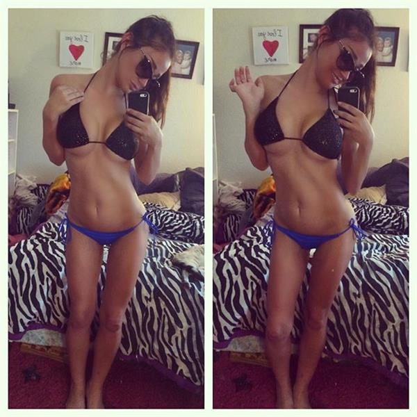 Kristina Basham in a bikini taking a selfie