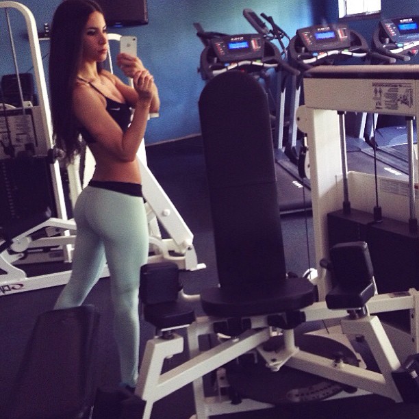 Jen Selter taking a selfie and - ass