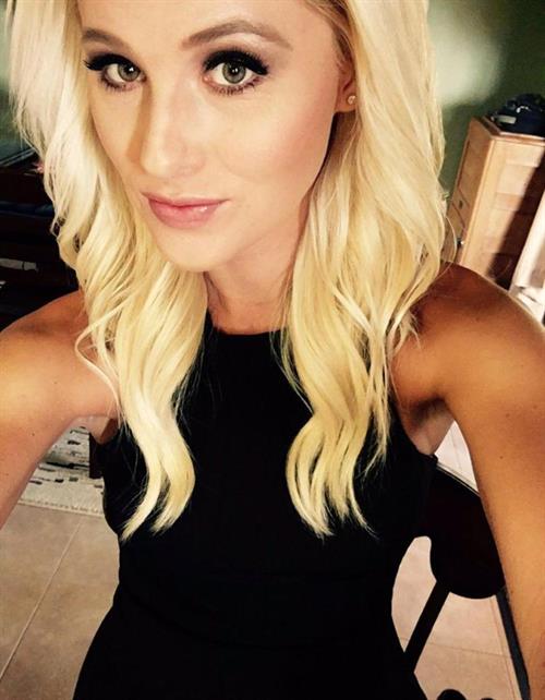 Tomi Lahren taking a selfie