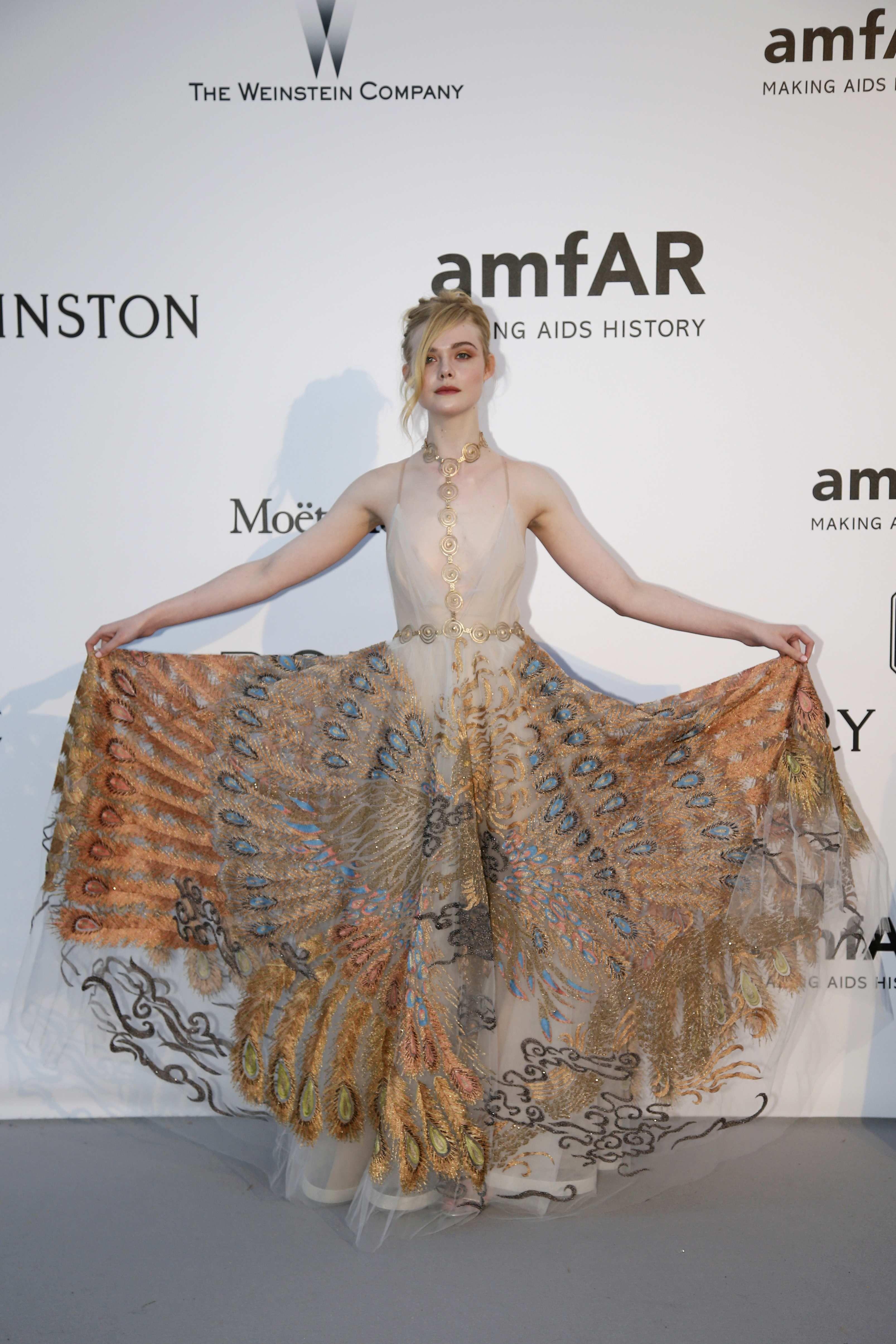 Elle Fanning showing off pasties at amfAR’s 23rd Cinema Against AIDS Gala