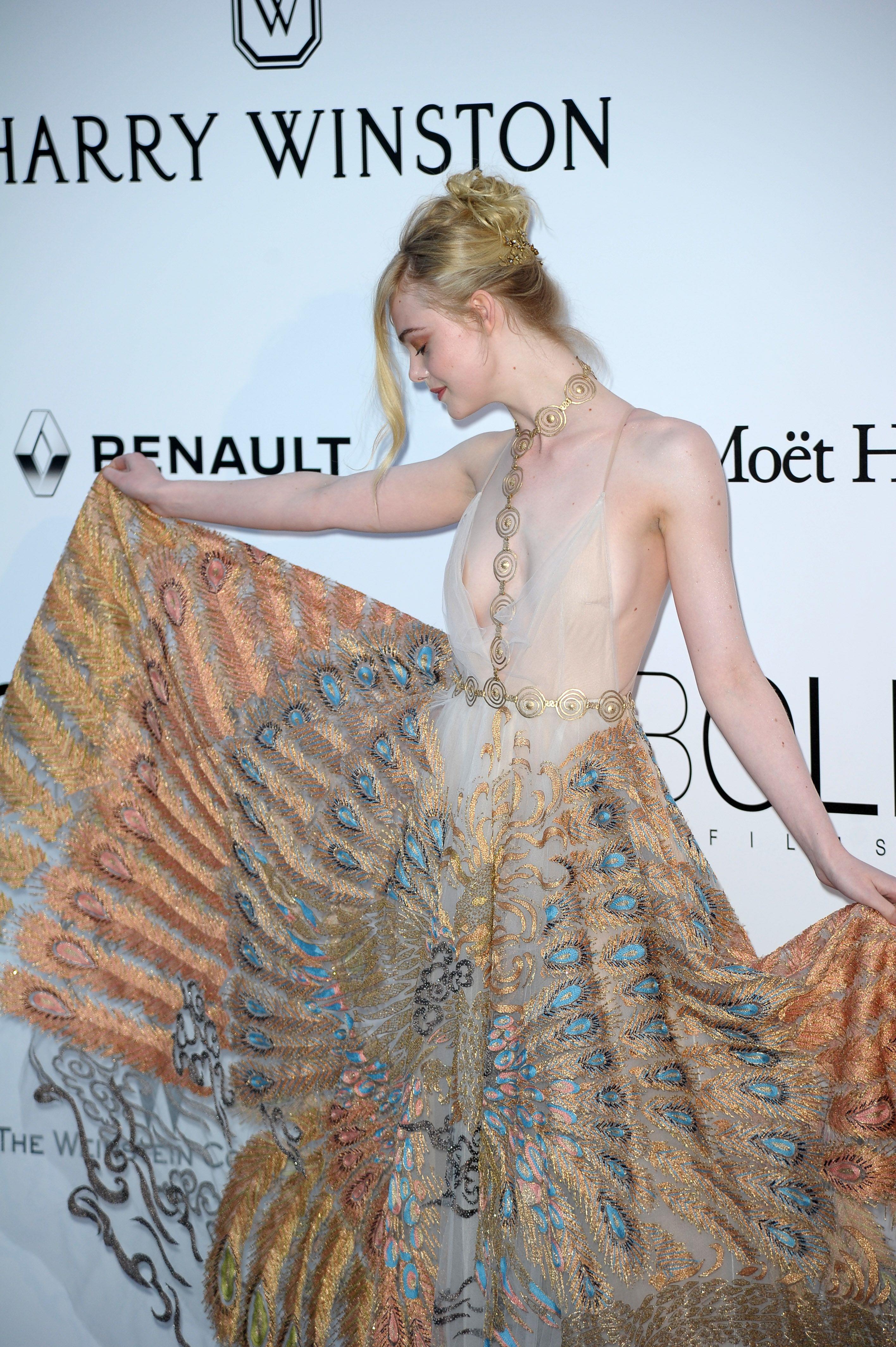 Elle Fanning showing off pasties at amfAR’s 23rd Cinema Against AIDS Gala