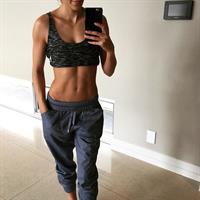 Kayla Itsines taking a selfie
