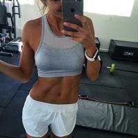 Kayla Itsines taking a selfie