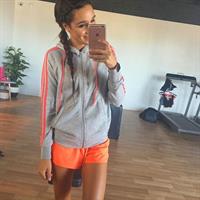 Kayla Itsines taking a selfie