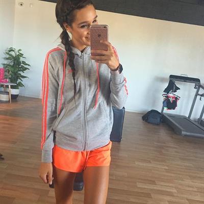 Kayla Itsines taking a selfie