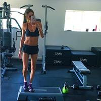 Kayla Itsines taking a selfie