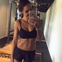 Kayla Itsines taking a selfie
