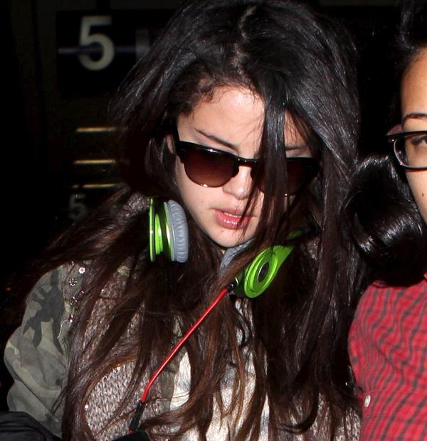 Selena Gomez – LAX airport arrival in LA 1/5/13 