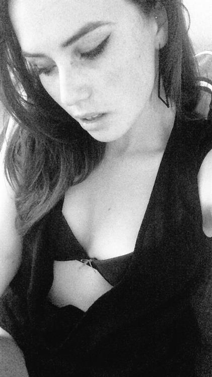 Alexis Young in lingerie taking a selfie