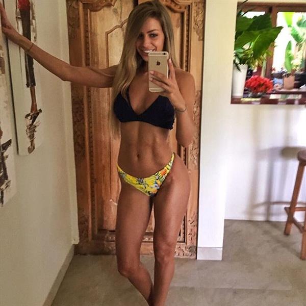Yanita Yancheva in a bikini taking a selfie