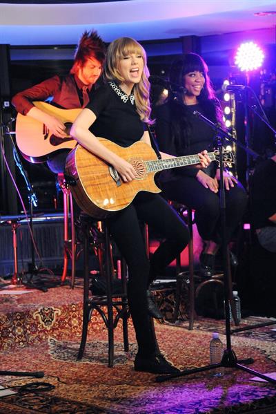 Taylor Swift performs at a private concert for NRJ on a barge on The Seine January 28, 2013 