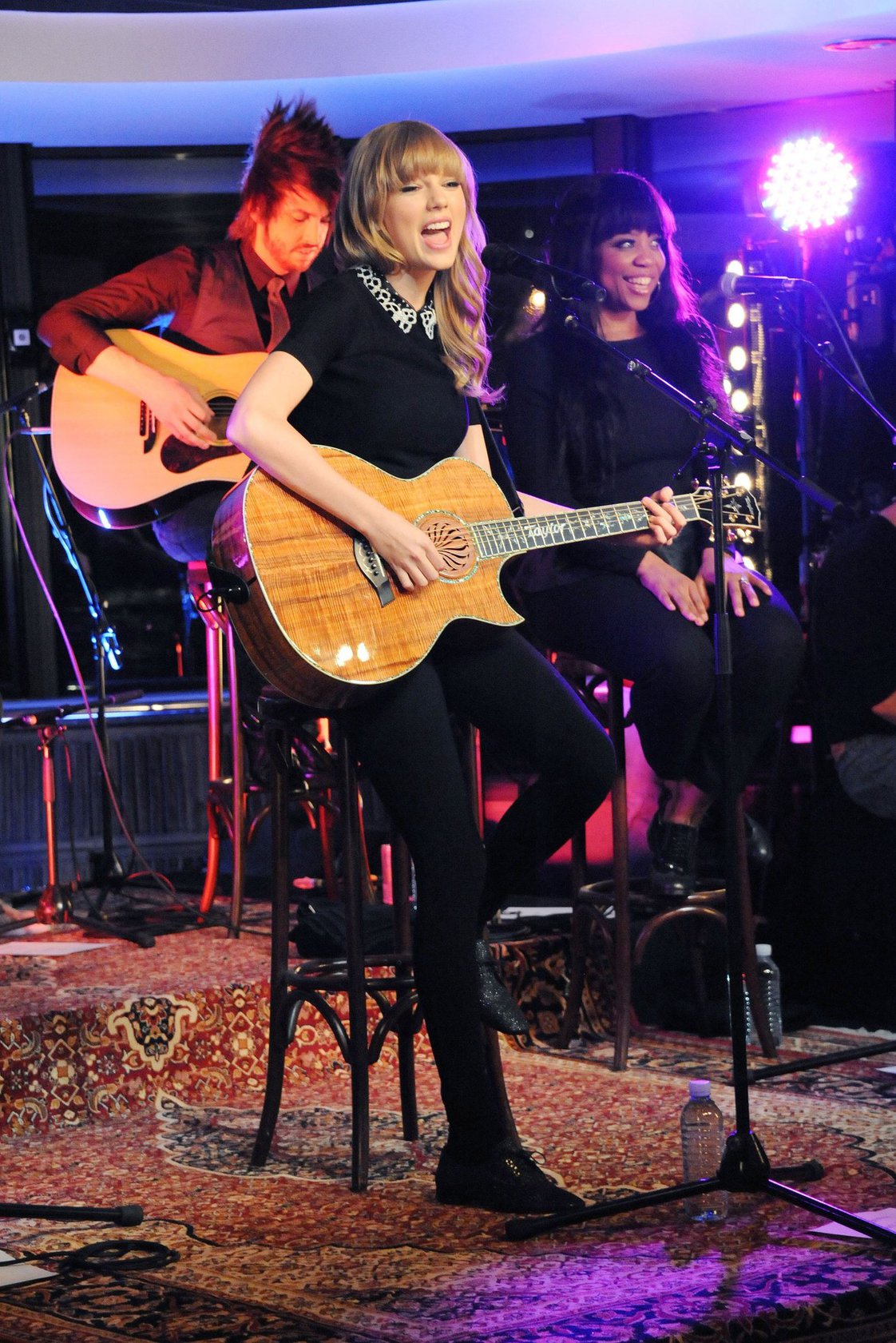 Taylor Swift performs at a private concert for NRJ on a barge on The Seine January 28, 2013 