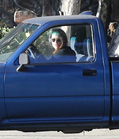 Kristen Stewart driving in Los Angeles - October 30, 2013  