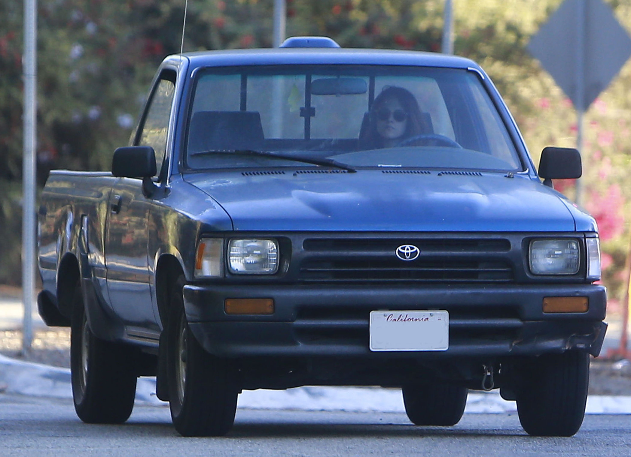 Kristen Stewart driving in Los Angeles - October 30, 2013  