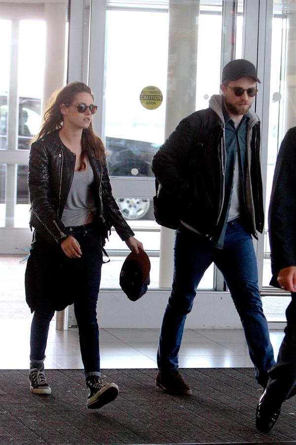 Kristen Stewart - Arrives at John F. Kennedy International Airport in New York City (8/5/2013) 