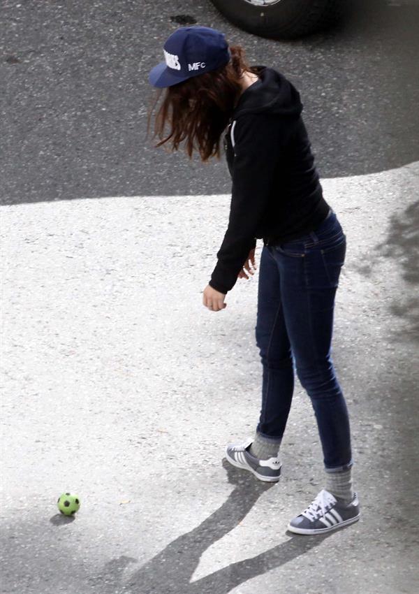 Kristen Stewart playing with a ball on the set of  Sils Maria  in Switzerland September 20, 2013  