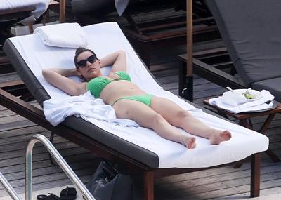 Kelly Brook bikini candids by the pool in Miami 2/1/13 