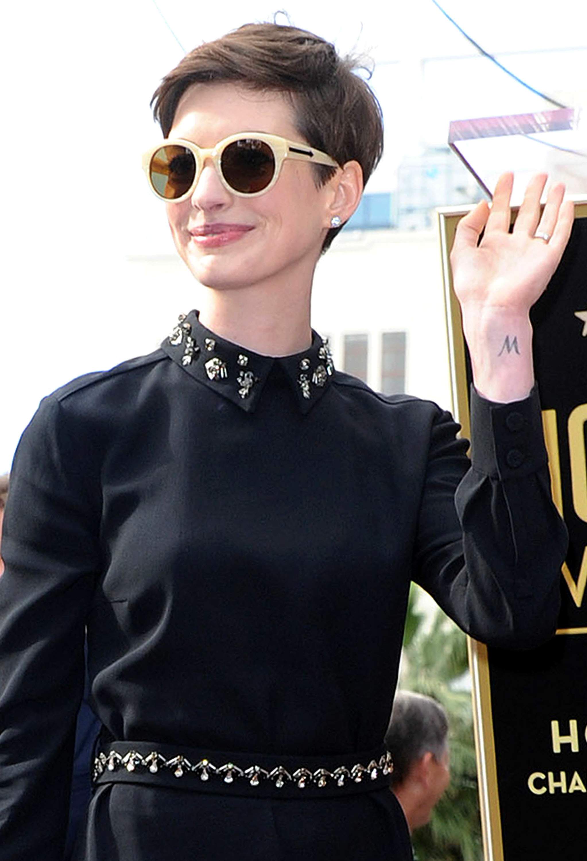 Anne Hathaway attends the Hugh Jackman Hollywood Walk Of Fame Ceremony in Hollywood December 13-2012 