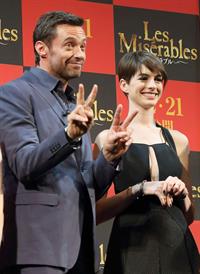 Anne Hathaway poses for photographers during an event to promote their latest movie 'Les Miserables' in Tokyo
