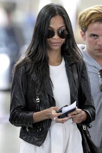 Zoe Saldana boarding an Alaska Airlines flight at LA Airport June 2nd 2009  