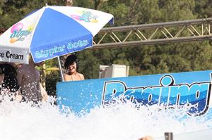 Katy Perry talks with a group of her friends after spending the afternoon at Raging Waters in San Dimas, California on August 12, 2012