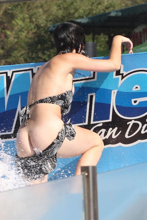 Katy Perry talks with a group of her friends after spending the afternoon at Raging Waters in San Dimas, California on August 12, 2012