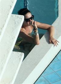 Katy Perry - In a bikini at a hotel pool in Miami July 27, 2012