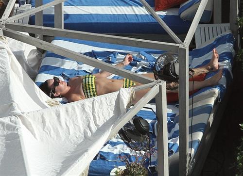 Katy Perry - In a bikini at a hotel pool in Miami July 27, 2012