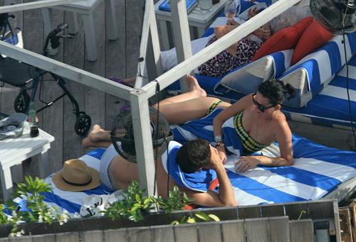 Katy Perry - In a bikini at a hotel pool in Miami July 27, 2012