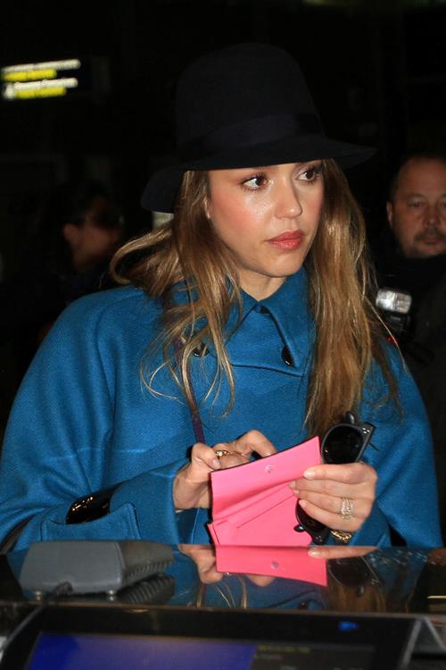 Jessica Alba arrives at Charles de Gaulle Airport in Paris 3/1/13 