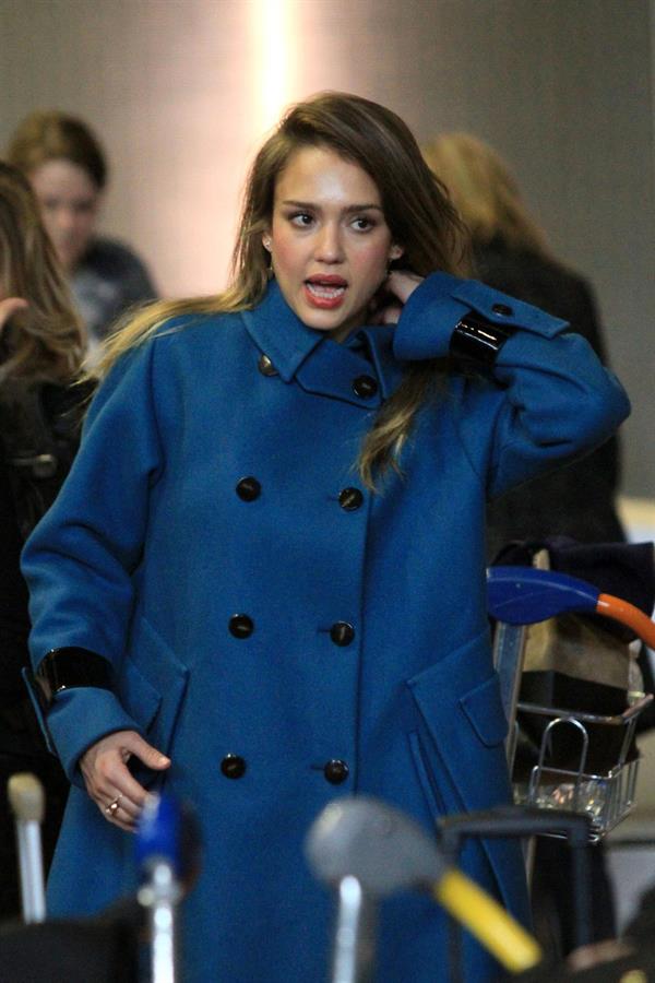 Jessica Alba arrives at Charles de Gaulle Airport in Paris 3/1/13 