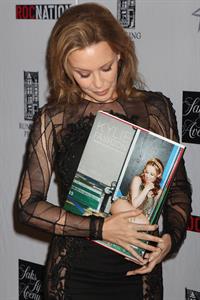 Kylie Minogue in a tight black mini dress for the launching of her book 'Kylie Fashion' at Saks Fifth Avenue
