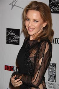 Kylie Minogue in a tight black mini dress for the launching of her book 'Kylie Fashion' at Saks Fifth Avenue