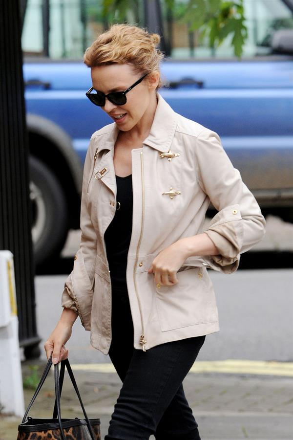 Kylie Minogue Leaving her management company in London August 30, 2012