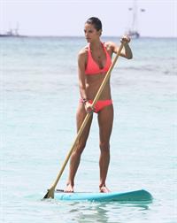 Alessandra Ambrosio paddleboarding in bikinis in Honolulu on October 12, 2011