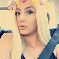 Tana Mongeau taking a selfie