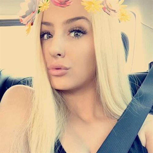 Tana Mongeau taking a selfie