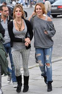 Ashley Greene and Miley Cyrus in Paris France on September 6, 2010 
