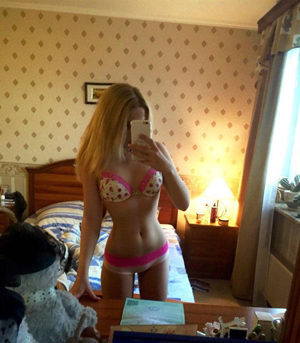 Alina Voronina in lingerie taking a selfie