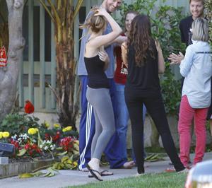 Jennifer Lawrence in Santa Monica helping a woman who fainted on June 25, 2012 