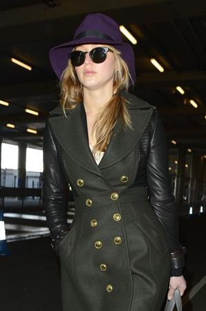 Jennifer Lawrence - Hot hat and glasses at Heathrow Airport in London (08.02.2013) 