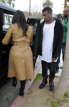 Kim Kardashian and Kanye West leave a medical building In Beverly Hills Dec 22, 2012 
