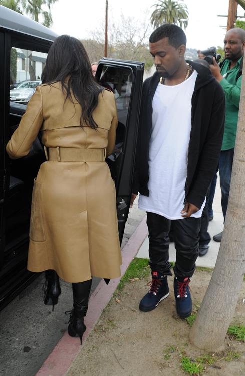 Kim Kardashian and Kanye West leave a medical building In Beverly Hills Dec 22, 2012 