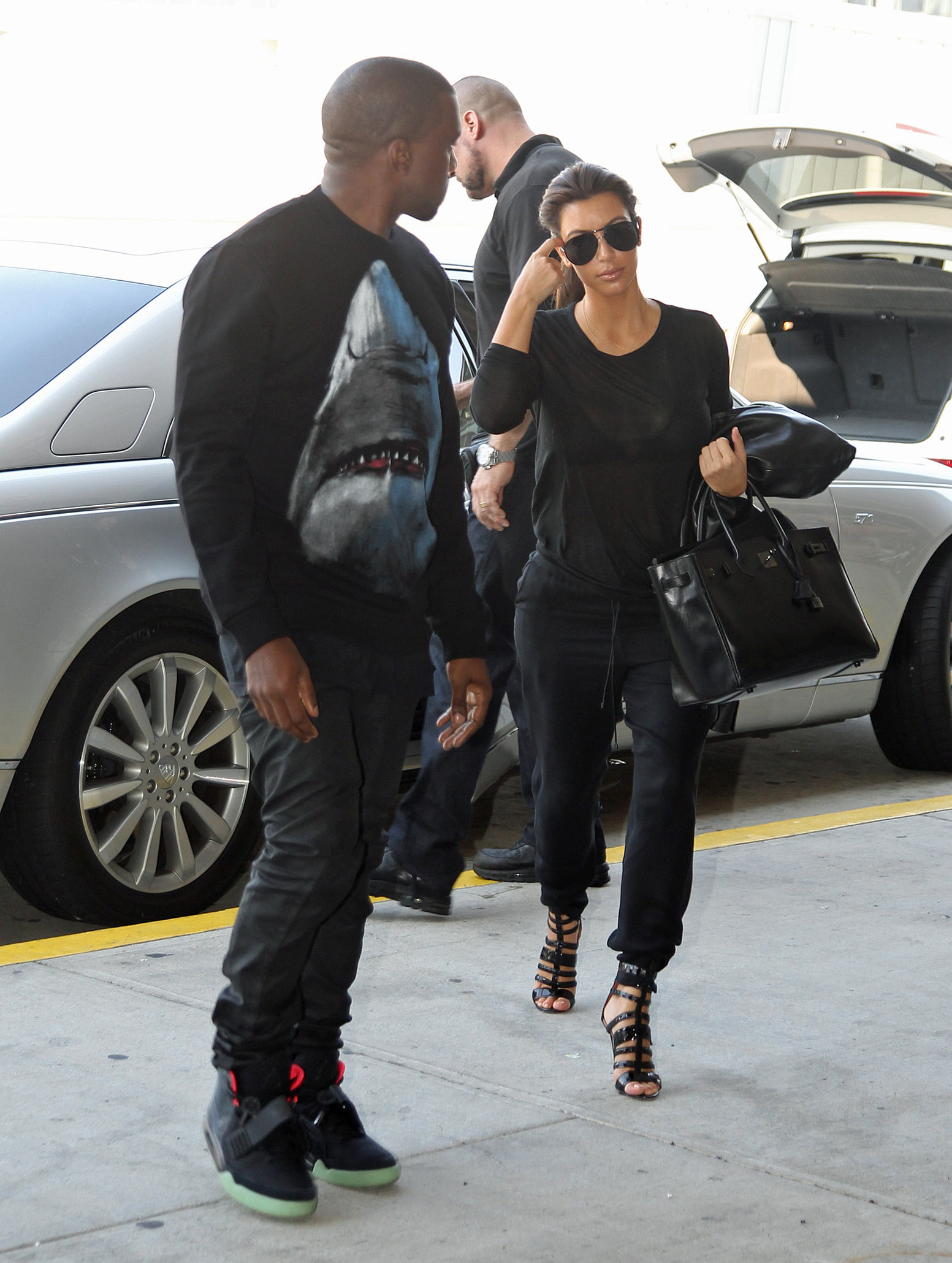 Kim Kardashian and Kanye West JFK airport in New York - 09 August 2012 