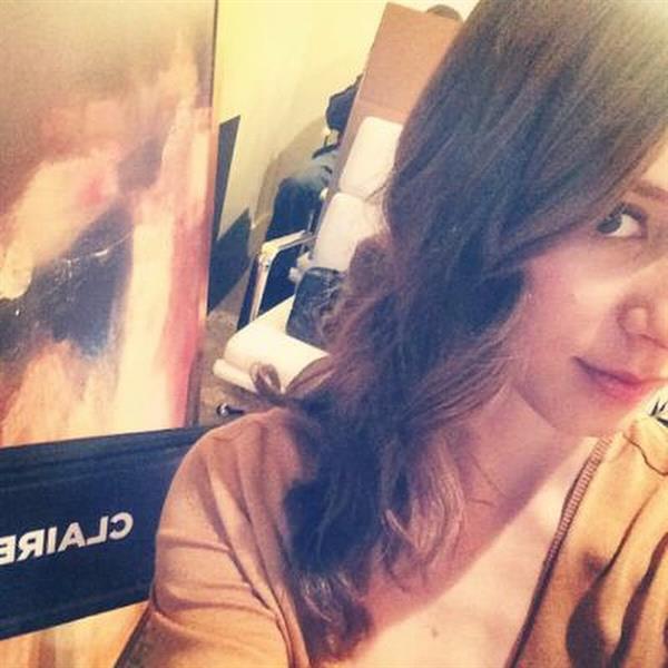 Troian Bellisario taking a selfie