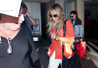 Ashley Tisdale arriving at LAX July 20, 2012 