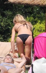 Abigail Clancy bikini candids in Italy on June 10, 2011 