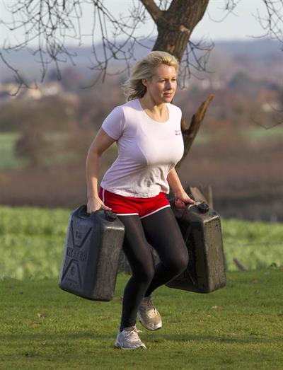 Abi Titmuss working out in a park in Kent December 5, 2011